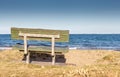 Bench seat overlooking the beach in New Zealand. Royalty Free Stock Photo
