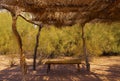 Bench in the Shade of a Desert Ramada