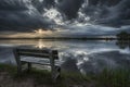 A bench sits in front of a calm lake, with a cloudy sky overhead, Calm before the storm, AI Generated Royalty Free Stock Photo