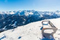 Bench in ski resort Bad Gastein in winter snowy mountains, Austria, Land Salzburg Royalty Free Stock Photo