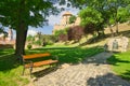 The bench and statue of John Vitez in park under Esztergom castle, Esztergom, Hungary