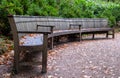 Bench at Stourhead National Trust property near Warminster in Wiltshire UK. Photographed in autumn wth leaves turning colour.