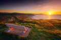 Bench at sunset with view of Azkorri beach in Getxo Royalty Free Stock Photo