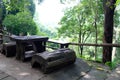 Bench to relax in the green tree area Royalty Free Stock Photo