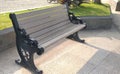 A bench in the town square for visitors to rest.