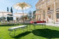 Bench with umbrella in the garden of a hotel in the tourist city of Zamora.