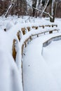 Bench under a snowdrift Royalty Free Stock Photo