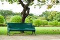 Bench under a tree. Royalty Free Stock Photo
