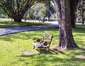 Bench under the tree, Park in Bangkok. Royalty Free Stock Photo