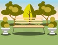 Bench under a tree in the park. Royalty Free Stock Photo