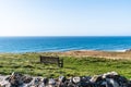 Bench with view of the cliffs on the north Cornish coast near Bude, England Royalty Free Stock Photo