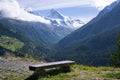 Bench with View of Mountains in the Alps, Switzerland.