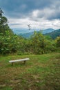 A Bench with a View of Stormy Clouds and Valley - 2