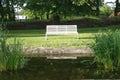 Bench and water Royalty Free Stock Photo