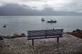 Bench on the waterfront on the lake Royalty Free Stock Photo