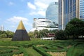 Benchasiri Park Pyramid with High Rise Buildings Royalty Free Stock Photo