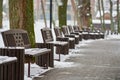 Benches covered with snow in winter park Royalty Free Stock Photo