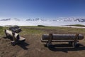 Benches on field above volcanoes of Kamchatka at sunrise