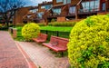 Benches and houses along the Waterfront Promenade in Canton, Baltimore, Maryland.