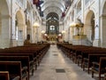 Benches inside and scenic interior of the Dome des Invalides cathedral, Paris