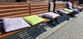 Benches with lots of cushions in different colors Royalty Free Stock Photo