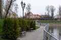 Benches near the lake in the city garden Royalty Free Stock Photo