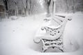 Benches in the park covered with snow Royalty Free Stock Photo
