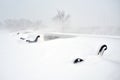 Benches in the park covered with snow Royalty Free Stock Photo