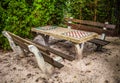 Benches in park with a table for a game in chess Royalty Free Stock Photo