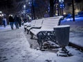 3 benches on the park at winter night