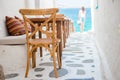 Beautiful typical greek outdoor cafe in Mykonos with amazing sea view on Cyclades islands Royalty Free Stock Photo