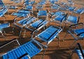 benches with plastic seat covers in blue at the deck of the ship Royalty Free Stock Photo
