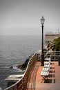 Benches on the promenade facing the Mediterranean Sea at Genoa Nervi Royalty Free Stock Photo