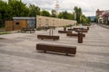 Benches for relaxation in the historic quarter of Gorky Street, opposite the old wooden houses, the turn of the XIX - XX centuries