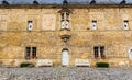 Benches in yard, ancient European tourist city Royalty Free Stock Photo