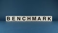 Benchmark. Cubes form the word Benchmark. Concept word Benchmark Royalty Free Stock Photo