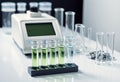 Benchtop spectroscopy setup with test tubes and analytical instrument in a lab Royalty Free Stock Photo