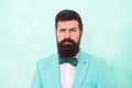 Bend his brows. brutal tuxedo man. formal and business fashion. groomed bearded man on special event. its wedding day Royalty Free Stock Photo