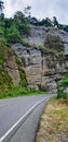 a bend in the road, with a mountain backdrop, cot panglima aceh Royalty Free Stock Photo