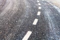 Bend on a slippery frozen road in winter