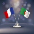 France VS AAlgeria flag Relation in a stand on table Royalty Free Stock Photo