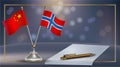 China VS Norway flag Relation in a small stand and paper on table Royalty Free Stock Photo