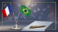 France VS Brazil flag Relation in a small stand and paper on table Royalty Free Stock Photo