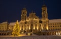Illuminated swiss abbey of Einsiedeln at blue hour in Christmas winter time