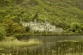 Benedictine monastery Kylemore Abbey in Connemara, County Galway, Ireland. Beautiful irish landscape with lake and mountains.