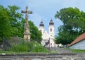 Benedictine Tihany Abbey in Hungary, with stone cross of Christ