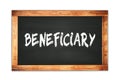 BENEFICIARY text written on wooden frame school blackboard