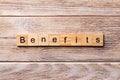 BENEFITS word written on wood block. BENEFITS text on wooden table for your desing, concept Royalty Free Stock Photo