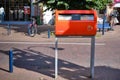 Benekom,The Netherlands-July,30,2020:Dutch red mailbox, letter box, by logistics company PostNL in a shopping street