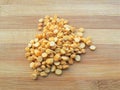 Bengal gram heap on wooden background Royalty Free Stock Photo